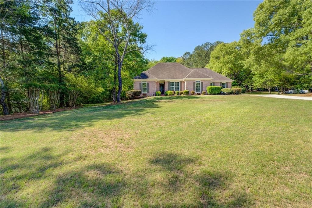 3 bedroom, 2 bathroom single family residence sold at 2611 Fireside Trail, Conyers, GA 30094