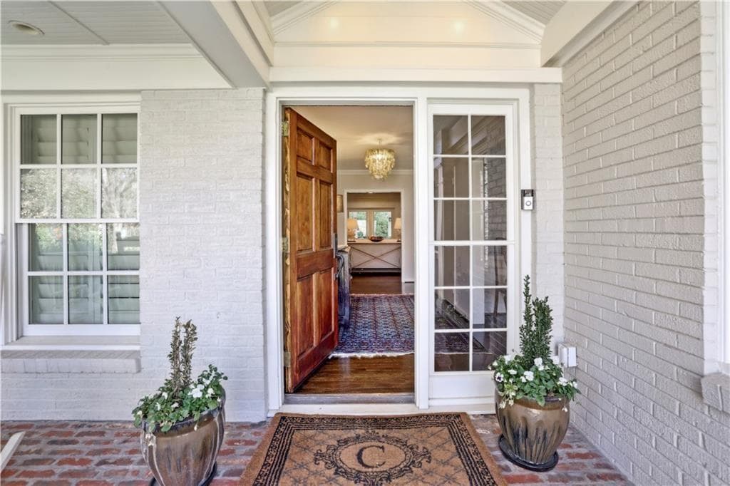 5 bedroom, 5 bathroom, 4,629 sq ft single family residence sold at 1299 W Wesley Road, Atlanta, GA 30327