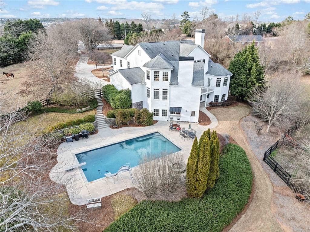 6 bedroom, 6 bathroom, 6,433 sq ft single family residence sold at 401 Nichols Drive, Suwanee, GA 30024
