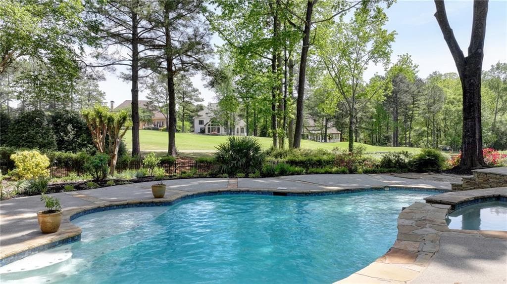 6 bedroom, 5 bathroom single family residence sold at 8130 Royal Troon Trace, Duluth, GA 30097