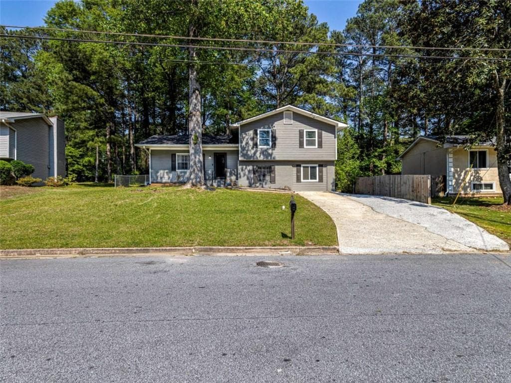 4 bedroom, 3 bathroom single family residence sold at 6465 Buckhurst Trail, South Fulton, GA 30349
