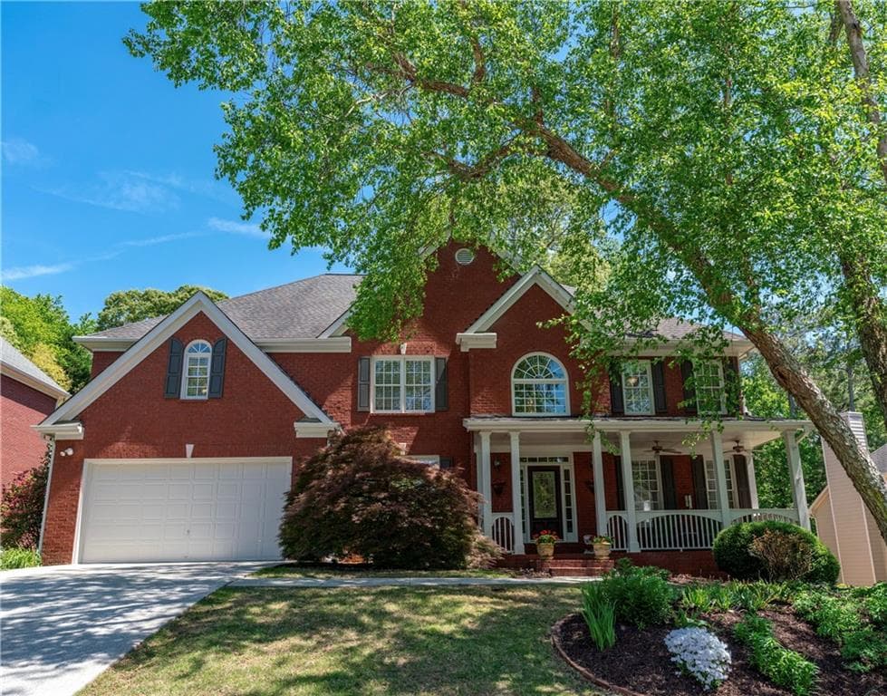 6 bedroom, 5 bathroom single family residence sold at 4035 Regal Oaks Drive, Suwanee, GA 30024