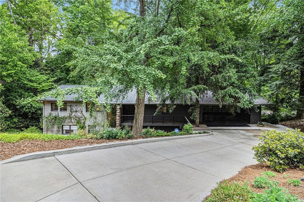 5 bedroom, 3 bathroom single family residence sold at 2361 Woodward Way, Atlanta, GA 30305