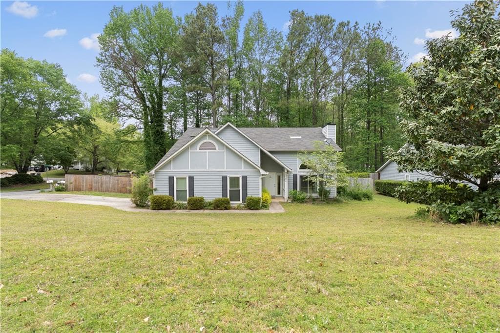 4 bedroom, 2 bathroom single family residence sold at 100 Karla Court, Roswell, GA 30076