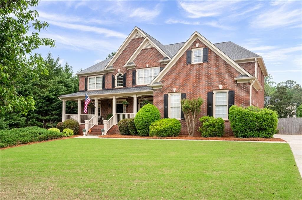 5 bedroom, 4 bathroom, 3,667 sq ft single family residence sold at 235 Rippling Drive, Marietta, GA 30064