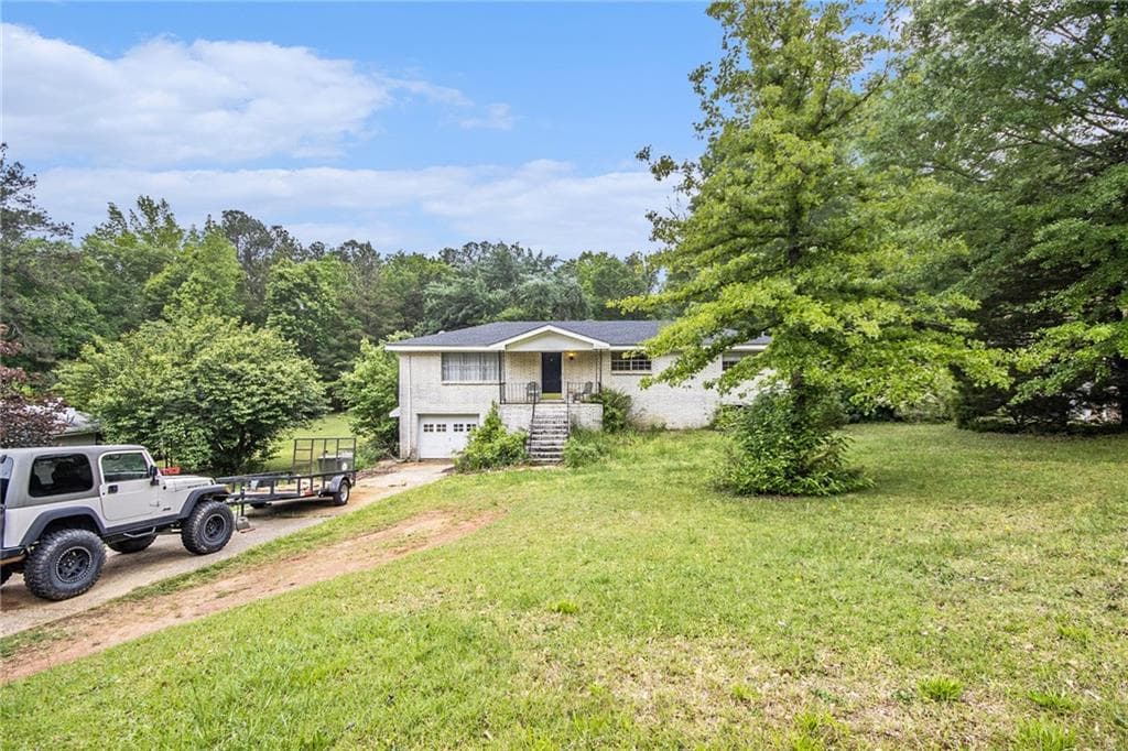 4 bedroom, 2 bathroom single family residence sold at 8600 Andy Mountain Court, Villa Rica, GA 30180