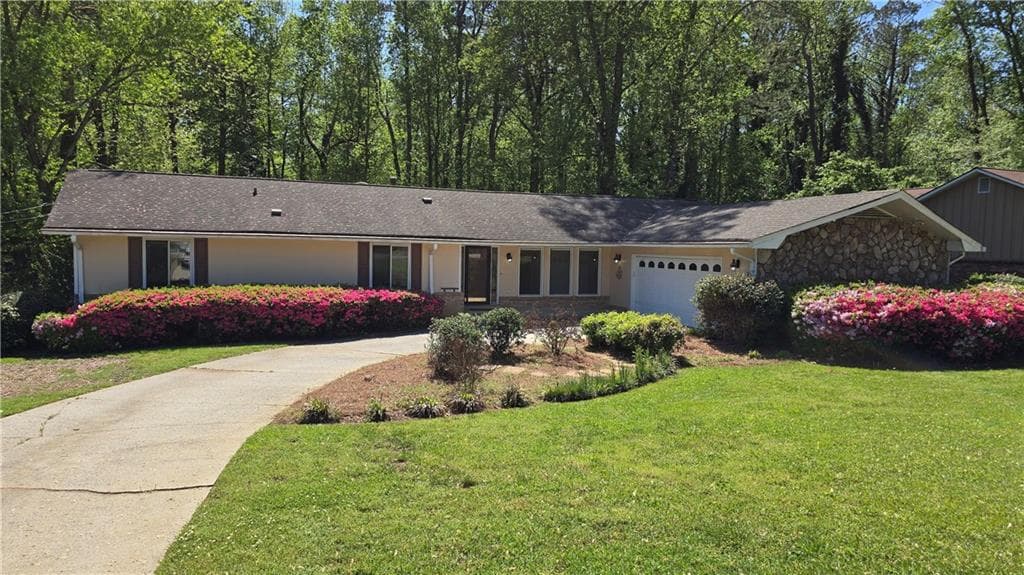4 bedroom, 2 bathroom single family residence sold at 1727 Rivermist Drive, Lilburn, GA 30047
