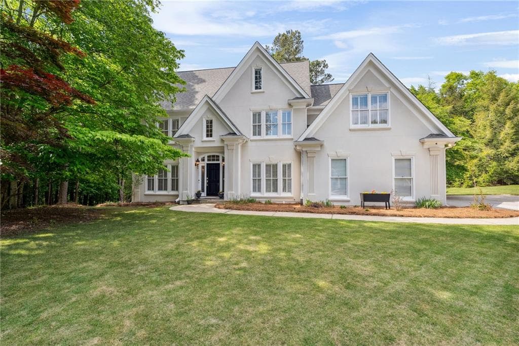 4 bedroom, 3 bathroom single family residence sold at 4585 Lakefield Bend, Berkeley Lake, GA 30096