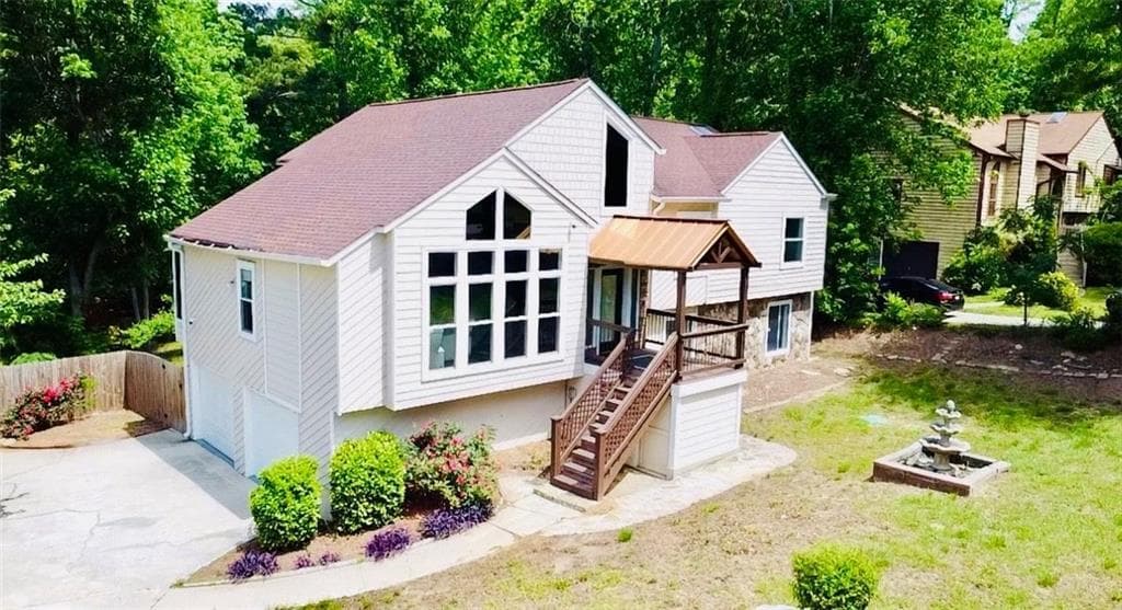4 bedroom, 3 bathroom single family residence sold at 3748 Woodrose Court, Snellville, GA 30039
