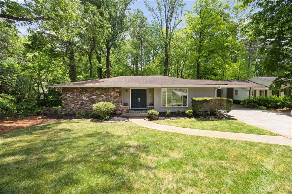4 bedroom, 2 bathroom single family residence sold at 239 Devonwood Drive, Atlanta, GA 30328