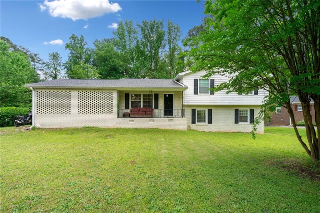 4 bedroom, 2 bathroom single family residence sold at 1448 Drayton Woods Drive, Tucker, GA 30084