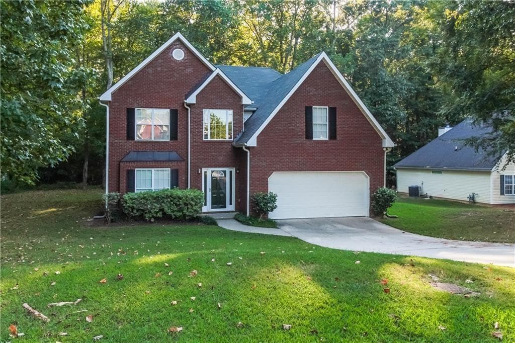 4 bedroom, 3 bathroom single family residence sold at 3910 Knotts Pass Road, Snellville, GA 30039