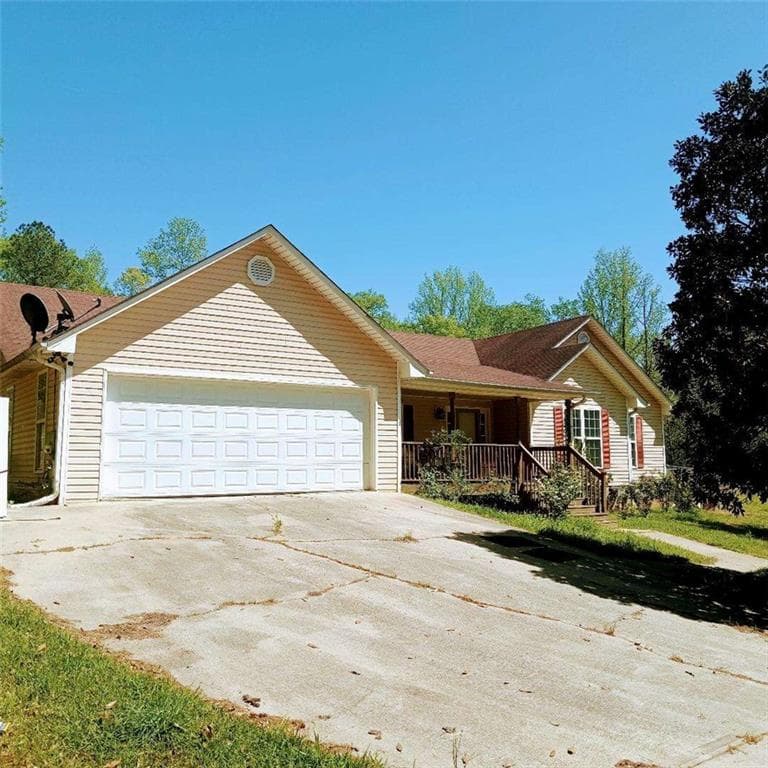 4 bedroom, 3 bathroom single family residence sold at 6690 Jenkins Road, Fairburn, GA 30213