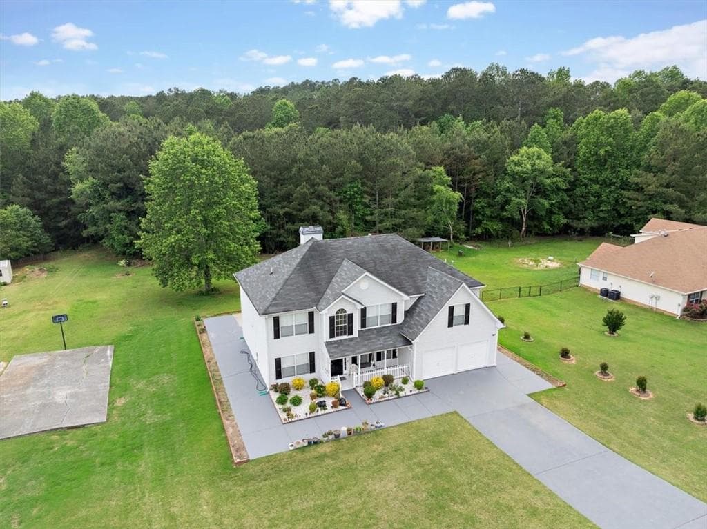 6 bedroom, 3 bathroom single family residence sold at 709 Mohansic Avenue, Loganville, GA 30052
