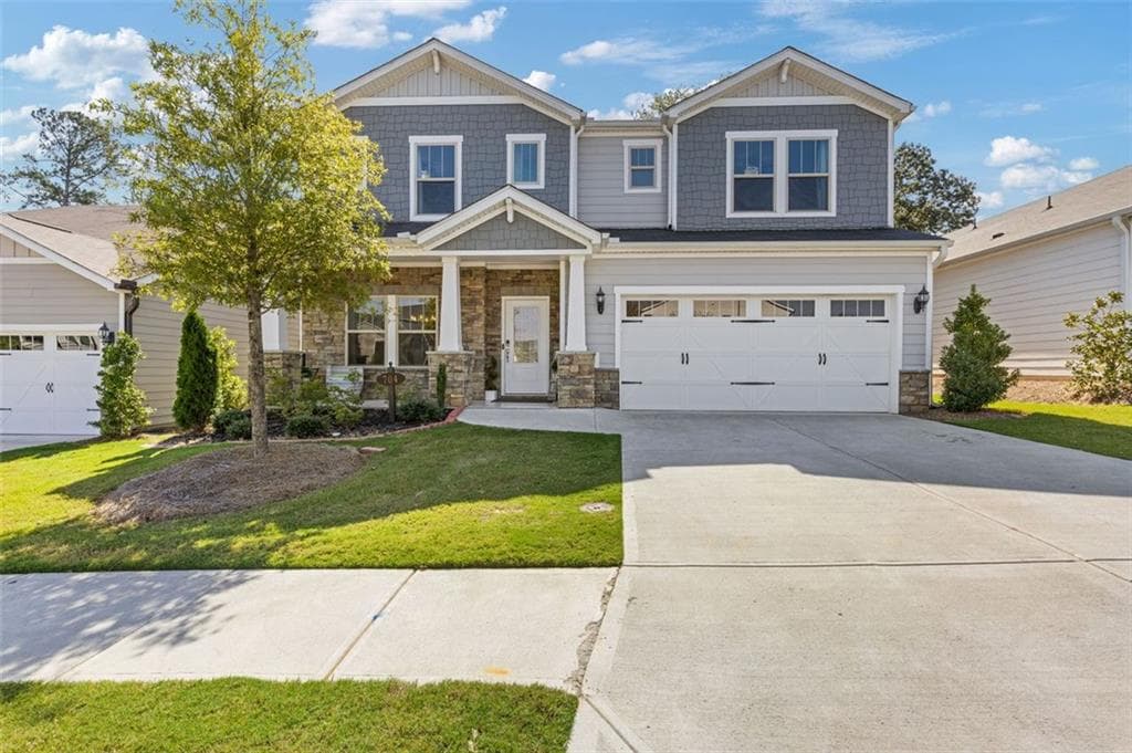 5 bedroom, 4 bathroom single family residence sold at 704 Chipping Sparrow Street, Canton, GA 30115