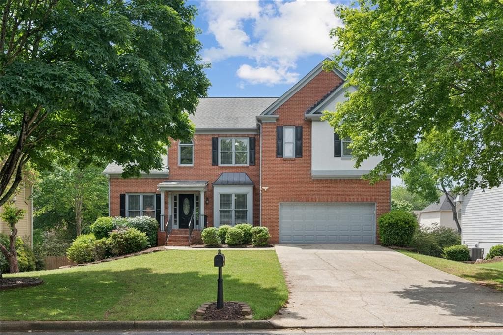 5 bedroom, 4 bathroom single family residence sold at 11040 Regal Forest Drive, Johns Creek, GA 30024