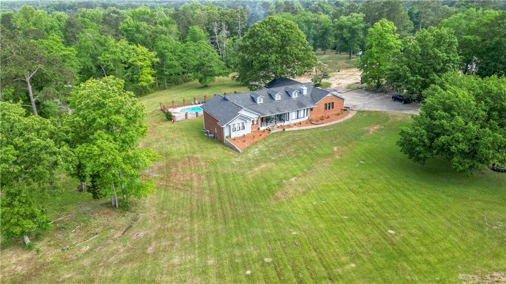 7 bedroom, 6 bathroom, 4,044 sq ft single family residence for sale at 2100 Highway 138 E, Stockbridge, GA 30281 — photo 2