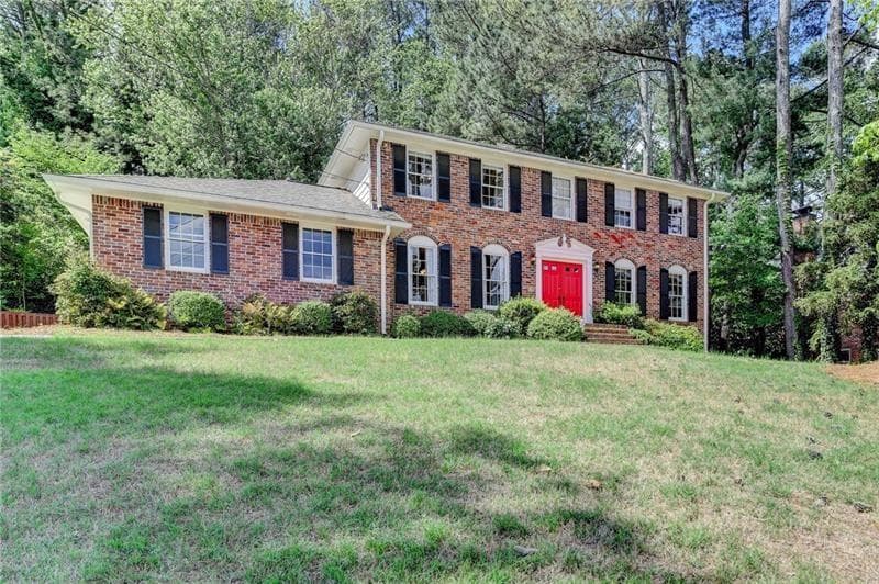 5 bedroom, 3 bathroom single family residence sold at 1450 Holly Bank Circle, Dunwoody, GA 30338