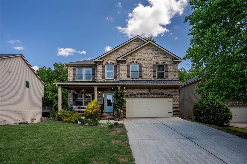 4 bedroom, 3 bathroom single family residence sold at 5655 Hedge Brook Drive, Cumming, GA 30028