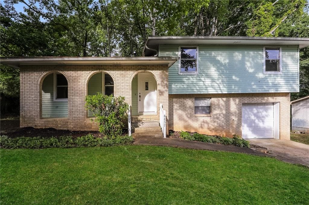 3 bedroom, 2 bathroom single family residence sold at 8857 Ashwood Drive, Riverdale, GA 30274