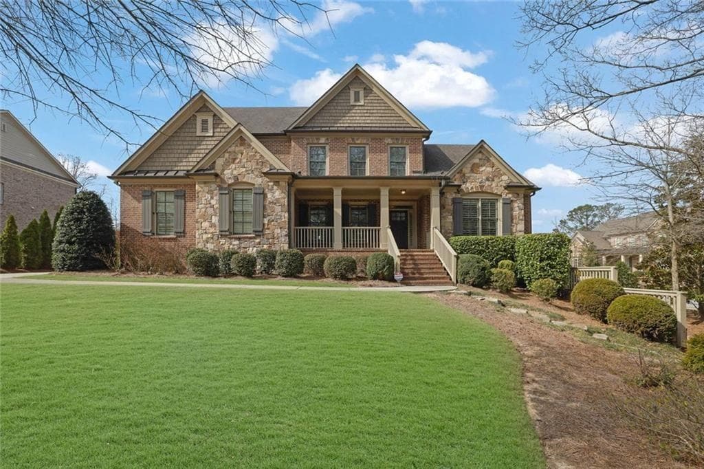 6 bedroom, 5 bathroom single family residence sold at 7740 Nesbit Ferry Road, Atlanta, GA 30350