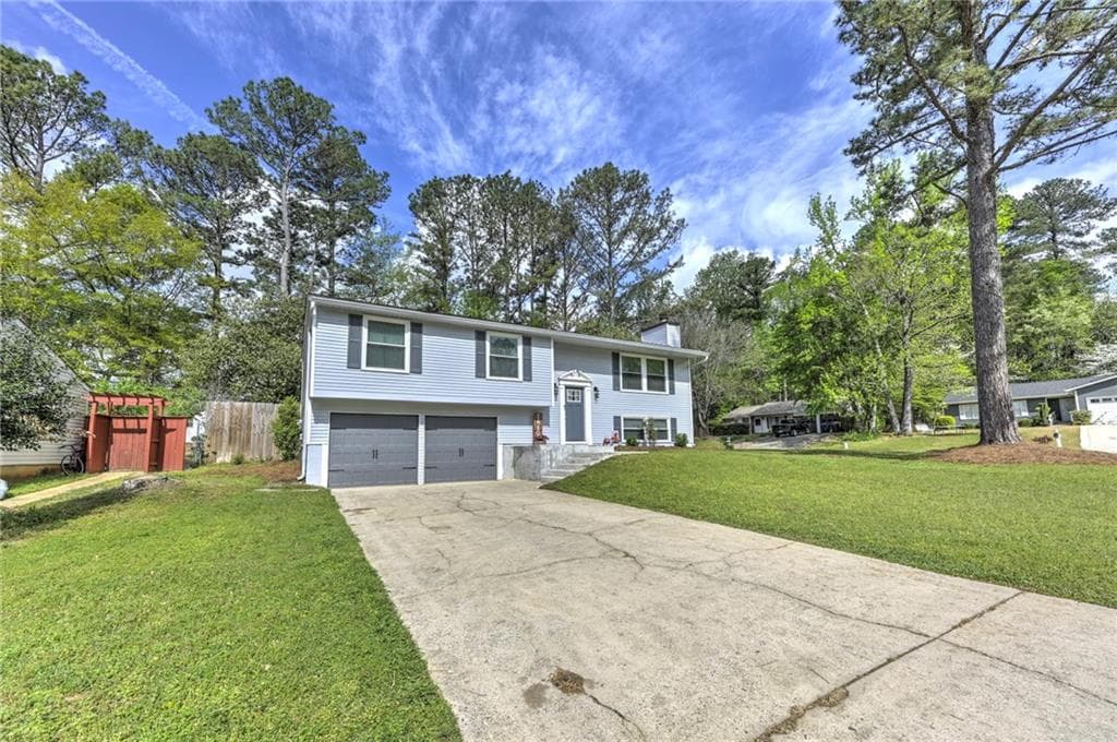 4 bedroom, 3 bathroom, 1,824 sq ft single family residence sold at 1460 Parkmont Drive, Roswell, GA 30076