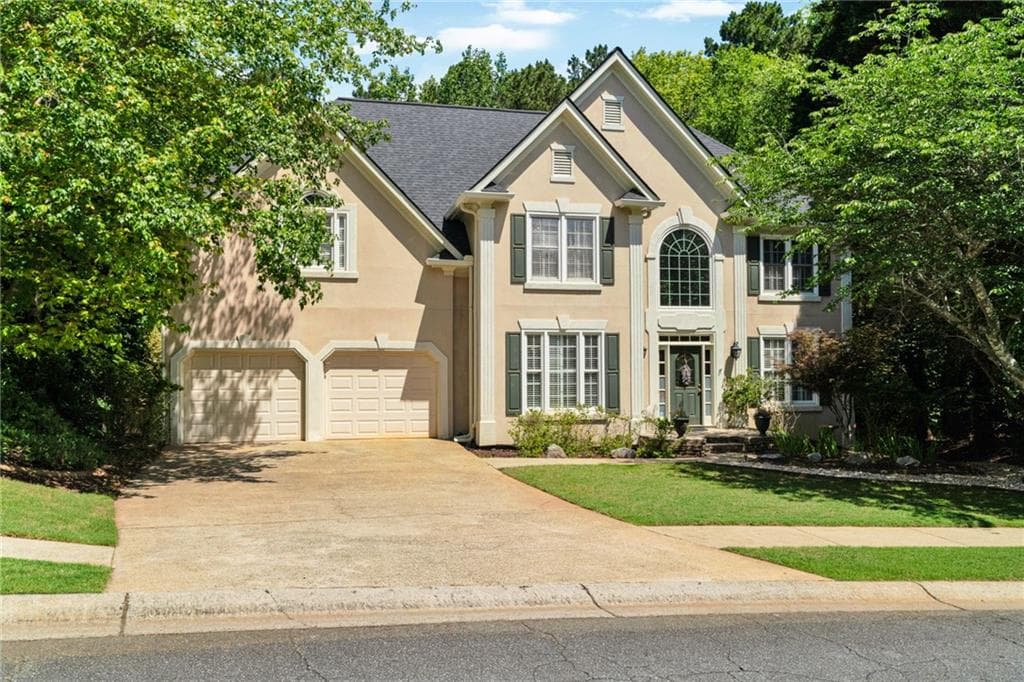 4 bedroom, 4 bathroom, 3,800 sq ft single family residence sold at 902 Laurel Crest Drive, Woodstock, GA 30189