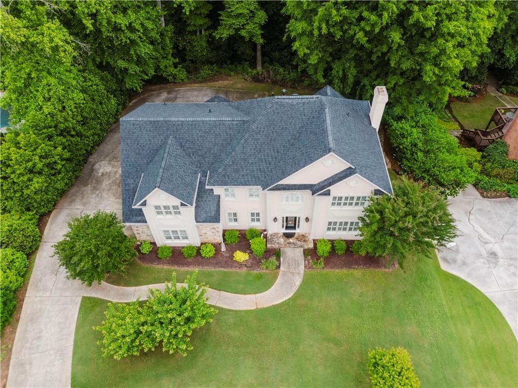 6 bedroom, 5 bathroom, 4,997 sq ft single family residence for sale at 2552 Berwick Walk, Snellville, GA 30078 — photo 2