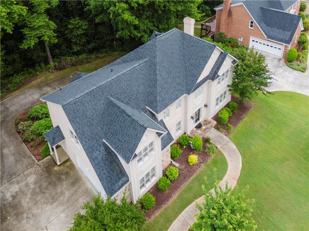 6 bedroom, 5 bathroom, 4,997 sq ft single family residence for sale at 2552 Berwick Walk, Snellville, GA 30078 — photo 3