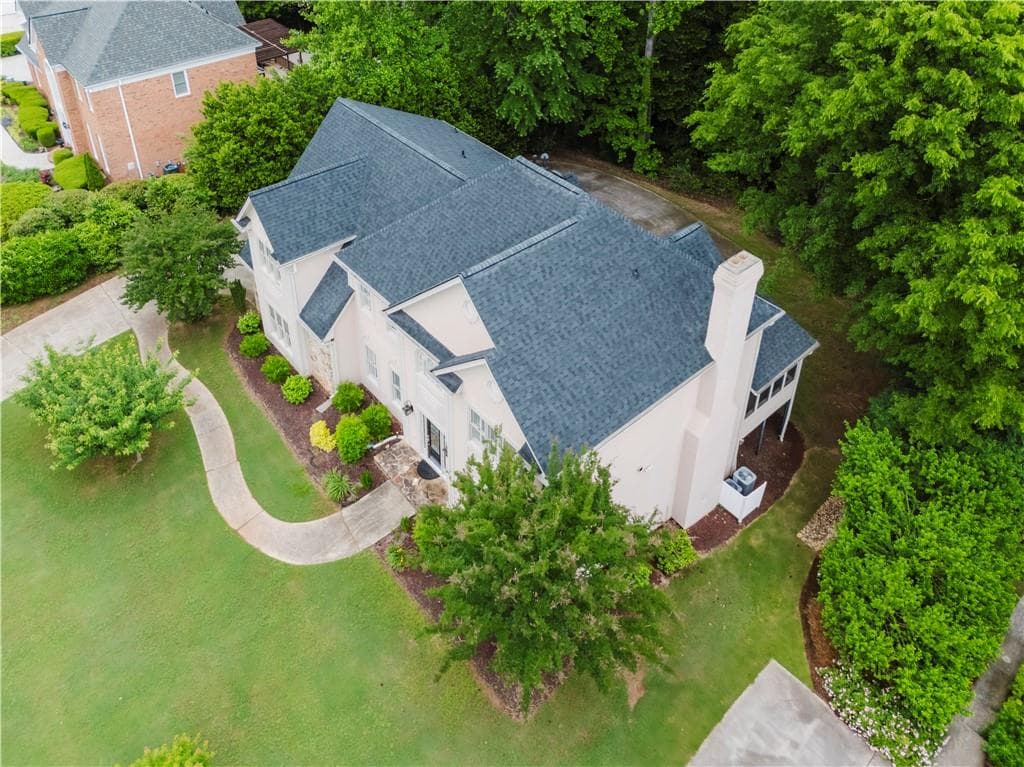 6 bedroom, 5 bathroom, 4,997 sq ft single family residence for sale at 2552 Berwick Walk, Snellville, GA 30078 — photo 4