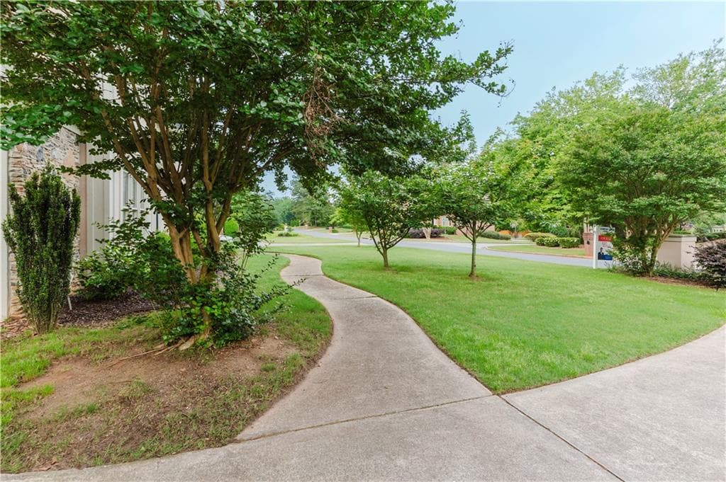 6 bedroom, 5 bathroom, 4,997 sq ft single family residence for sale at 2552 Berwick Walk, Snellville, GA 30078 — photo 9