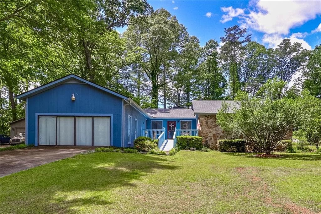 4 bedroom, 3 bathroom single family residence sold at 3739 Lake Carlton Road, Loganville, GA 30052