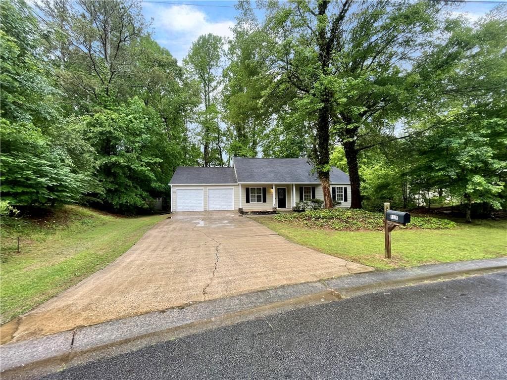 3 bedroom, 2 bathroom, 1,356 sq ft single family residence sold at 6026 Woodcreek Drive, Woodstock, GA 30188