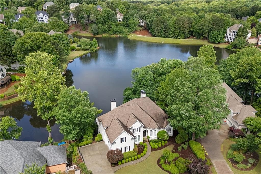 5 bedroom, 5 bathroom single family residence sold at 9115 Nesbit Lakes Drive, Alpharetta, GA 30022