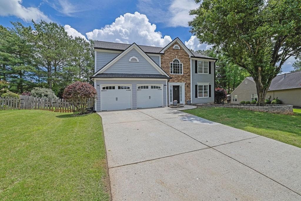 4 bedroom, 4 bathroom single family residence sold at 516 Broad Head Point, Suwanee, GA 30024