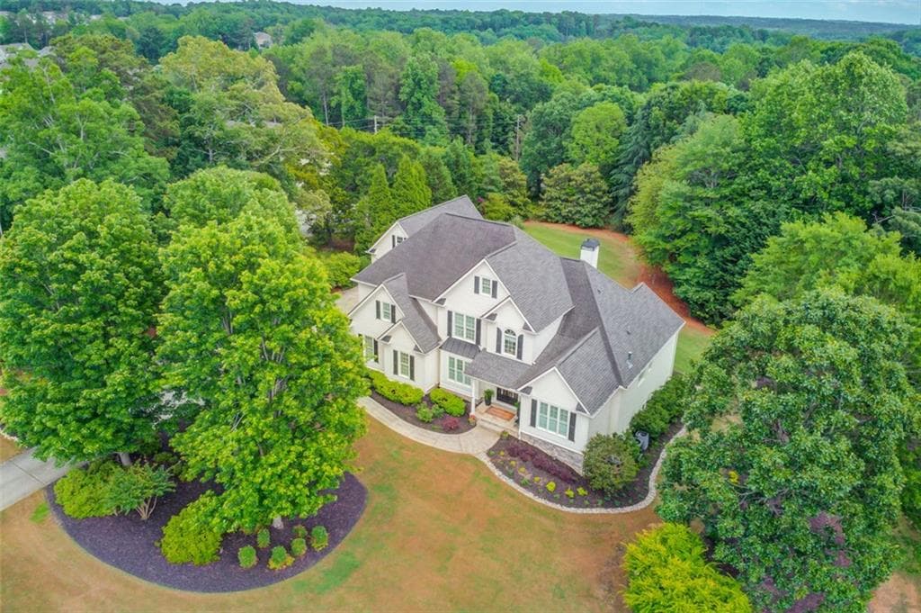 4 bedroom, 5 bathroom single family residence sold at 4809 HIGHLAND POINT Drive, Auburn, GA 30011