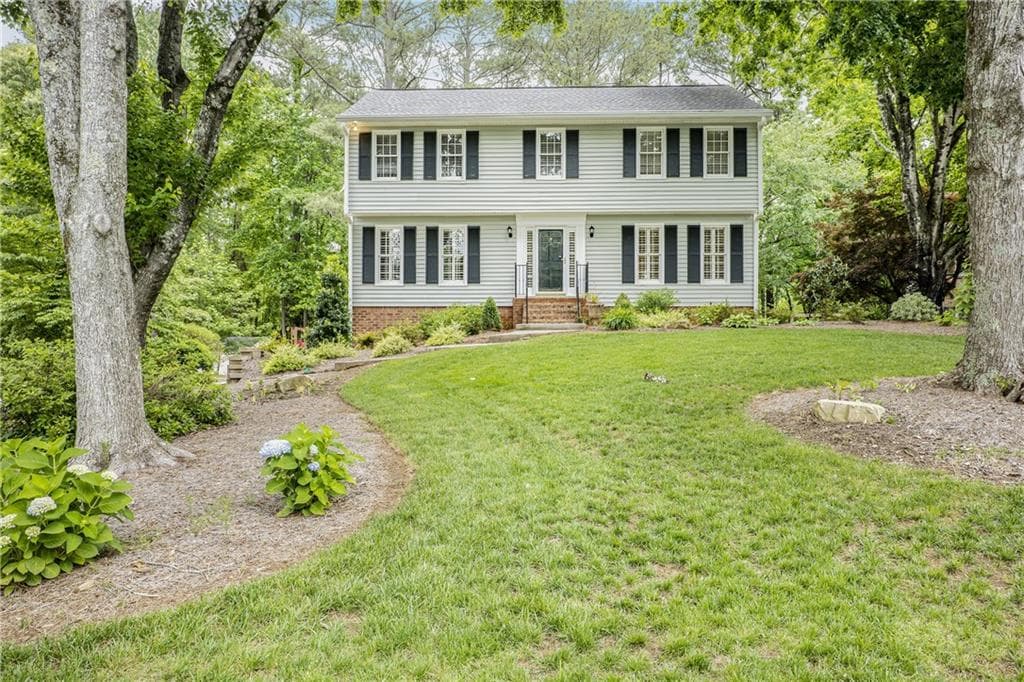 4 bedroom, 3 bathroom single family residence sold at 3320 Woodleaf Way, Marietta, GA 30062