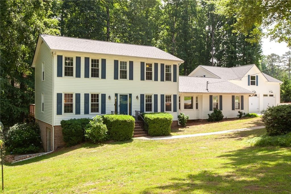 4 bedroom, 3 bathroom, 3,558 sq ft single family residence sold at 5322 Seaton Drive, Dunwoody, GA 30338
