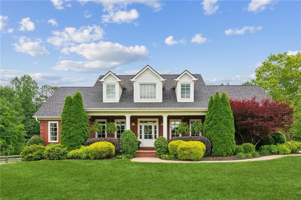 4 bedroom, 5 bathroom, 5,148 sq ft single family residence sold at 5945 Bannister Road, Cumming, GA 30028