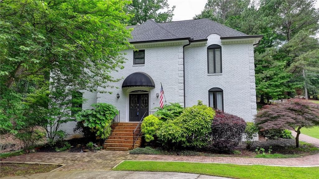 6 bedroom, 5 bathroom, 5,314 sq ft single family residence sold at 5025 Oak Bluff Court, Atlanta, GA 30350