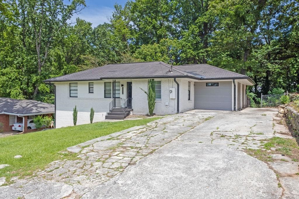 4 bedroom, 2 bathroom, 1,329 sq ft single family residence for sale at 2636 Flagstone Drive, Atlanta, GA 30316 — photo 2
