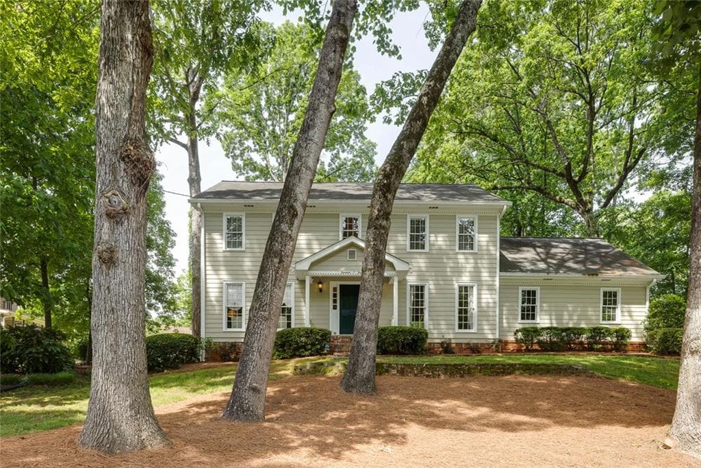 4 bedroom, 3 bathroom single family residence sold at 1404 Vernon North Drive, Dunwoody, GA 30338