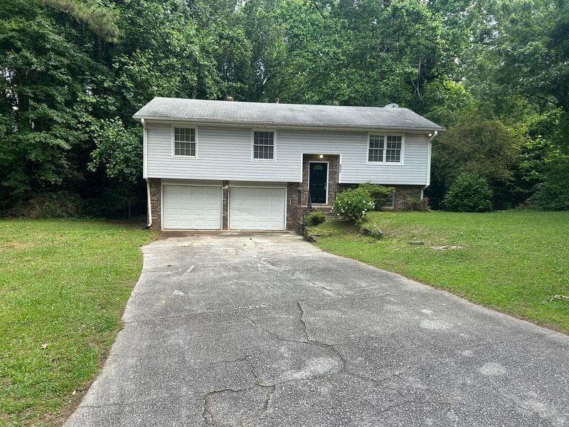 5 bedroom, 3 bathroom, 1,864 sq ft single family residence sold at 6956 Kimberland Gardens Lane, Lithonia, GA 30058