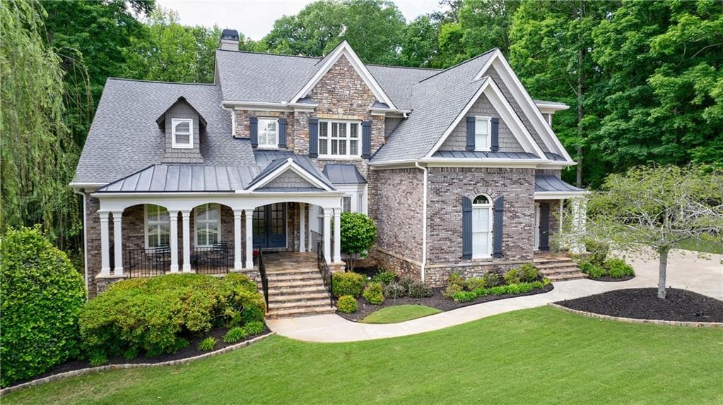 7 bedroom, 6 bathroom, 6,898 sq ft single family residence sold at 2101 Hunters Green Drive, Lawrenceville, GA 30043