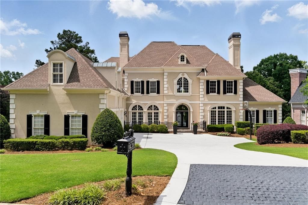 5 bedroom, 7 bathroom single family residence sold at 1409 Spyglass Hill Drive, Johns Creek, GA 30097