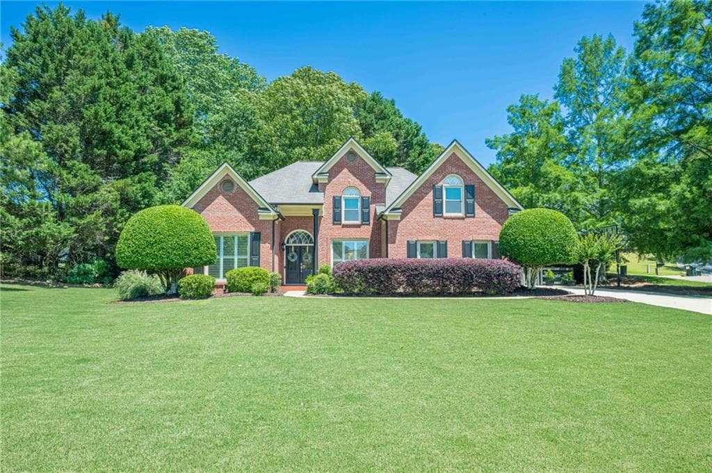 4 bedroom, 3 bathroom, 2,740 sq ft single family residence sold at 7045 Grand View Way, Suwanee, GA 30024