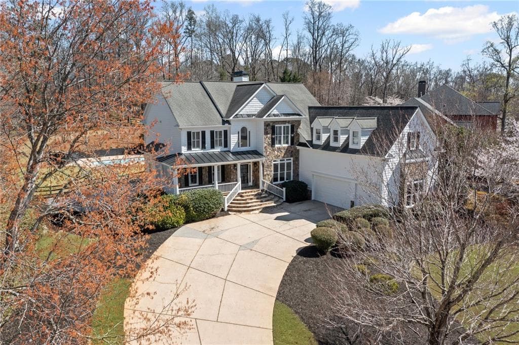6 bedroom, 6 bathroom, 5,953 sq ft single family residence sold at 410 S Burgess Trail, Milton, GA 30004