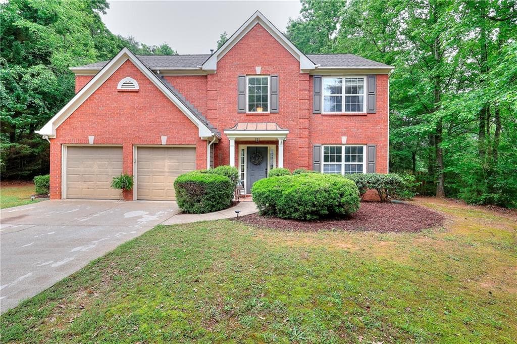 3 bedroom, 3 bathroom, 2,013 sq ft single family residence sold at 5765 Woodstone Drive, Cumming, GA 30028