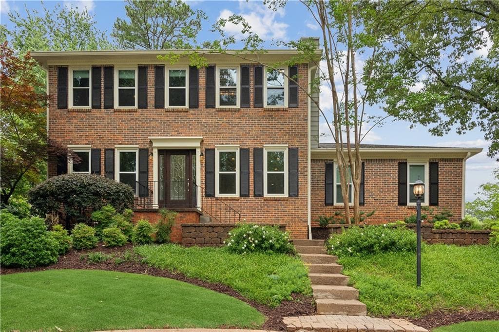 4 bedroom, 3 bathroom single family residence sold at 9800 WOODFALL Drive, Roswell, GA 30076