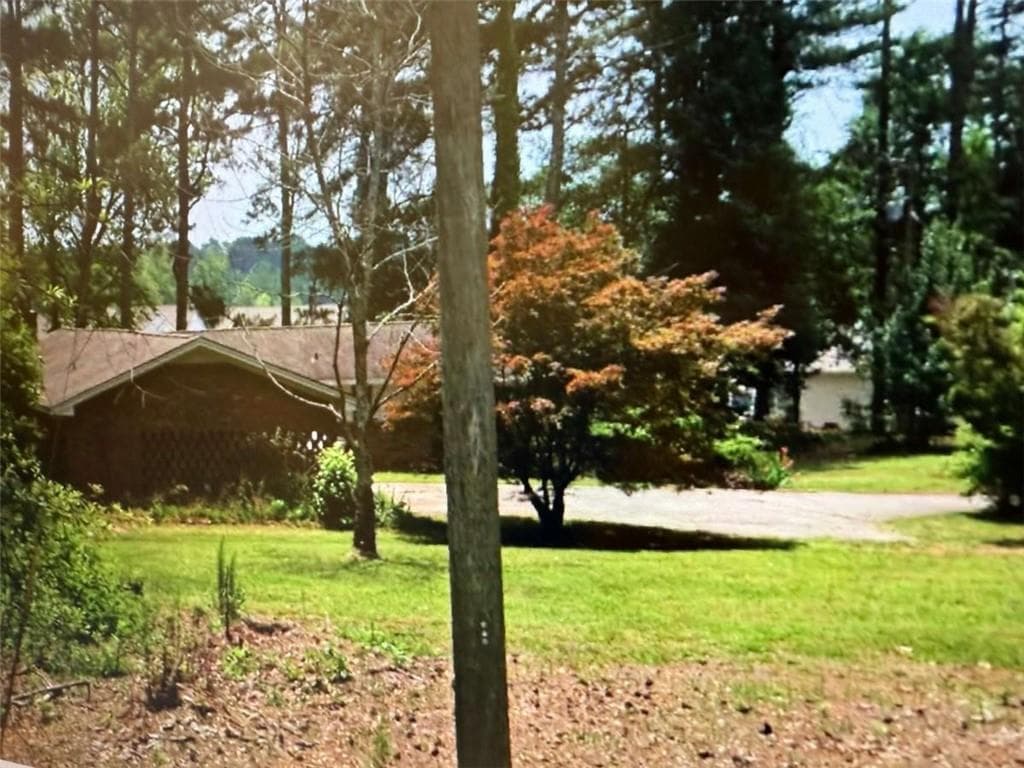 3 bedroom, 2 bathroom single family residence sold at 5621 McEver Road, Flowery Branch, GA 30542